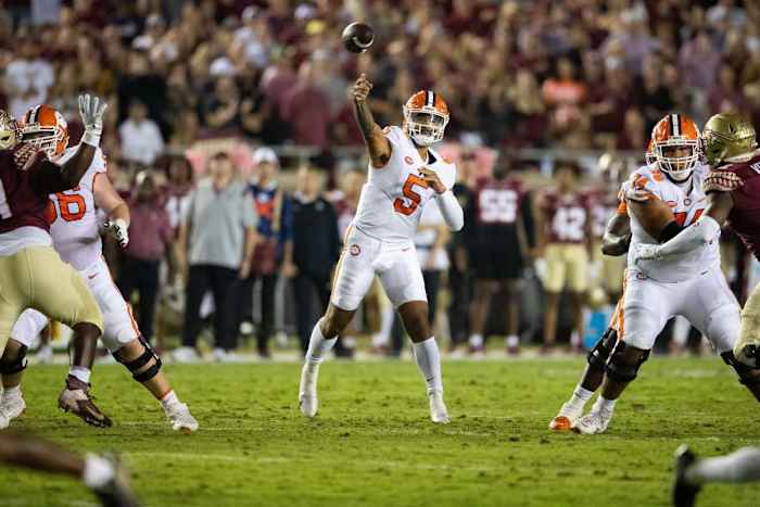 Clemson quarterback DJ Uiagalelei throws a pass against the Florida State Seminoles.